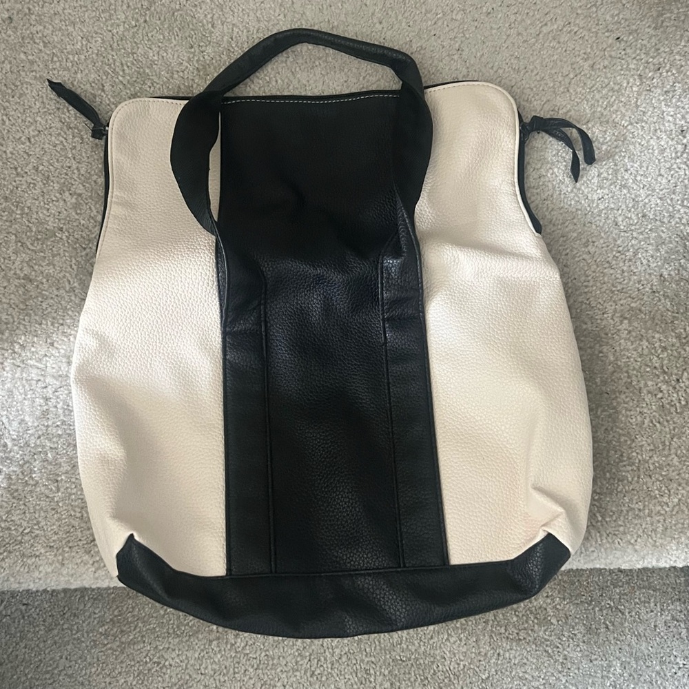 Black & Beige messenger bag exterior 100% pvc, interior 100% polyester 17"x16"